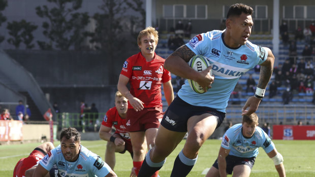 Prolific: Folau crosses in the first half as he edges towards a new record.