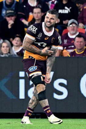 Adam Reynolds grabs his arm in a worrying sign for the Broncos.