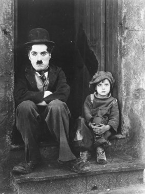 Charlie Chaplin and Jackie Coogan in his 1921 film The Kid.