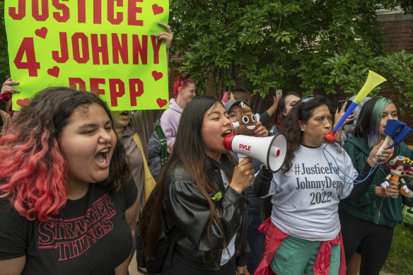 Supporters of actor Johnny Depp rally outside of Fairfax County Courthouse.