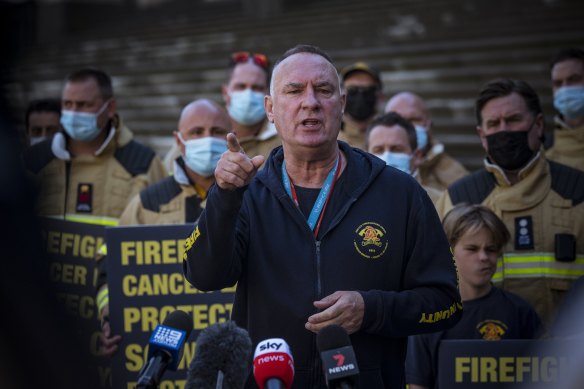 Peter Marshall addresses the media on Monday. He has vowed to campaign against the Labor Party if presumptive rights legislation expands to other workers. 