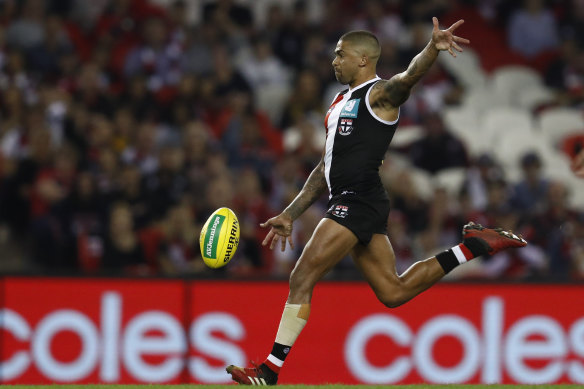 Bradley Hill gets a kick away for St Kilda in their win over Hawthorn.