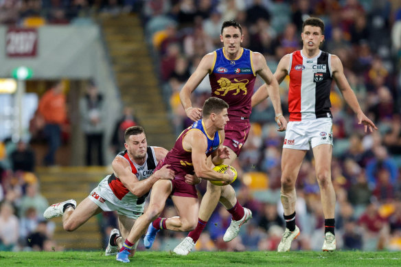 Dayne Zorko of the Lions is tackled by Brad Crouch of the Saints during their round 24 clash.
