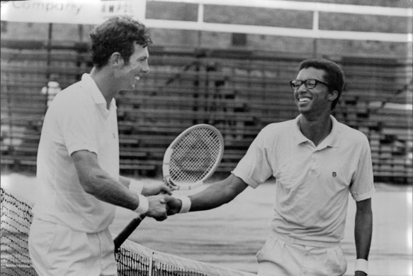 Arthur Ashe, right, is congratulated by Dick Crealy after winning the 1970 Australian Open men's singles.