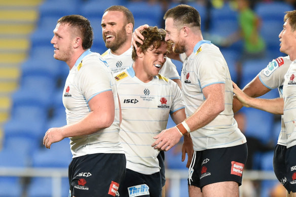 Michael Hooper is congratulated for scoring in his comeback match.