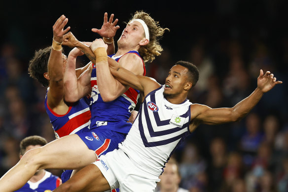 Aaron Naughton flies for a mark against the Dockers.