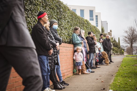 The crowd watches on at the Maribyrnong auction.