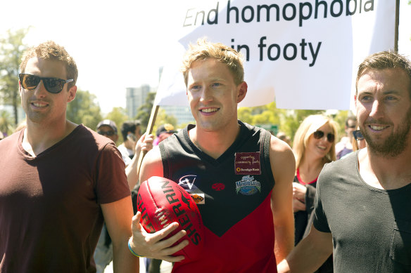 Jason Ball takes part in a pride march in 2013.