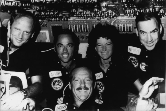 The STS-7 crew poses for a portrait in Challenger’s flight deck area 
during the Earth orbital mission. From left are mission specialist Norman Thagard, commander Robert Crippen, pilot Frederick Hauck, and mission specialists Sally Ride and John Fabian.