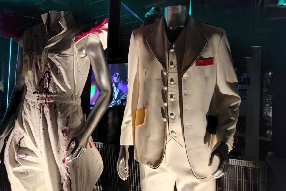 Mannequins are dressed in recognisable outfits Johns has worn during his career.