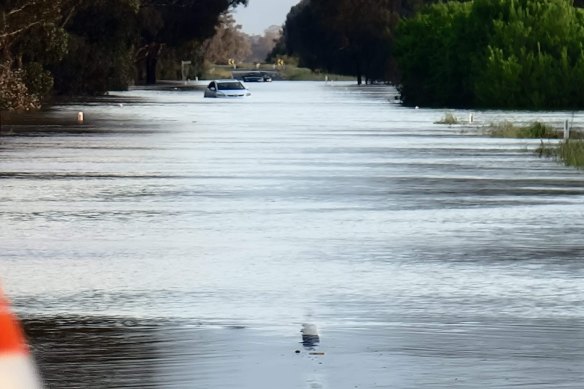 People trapped in their cars in floodwater were rescued by SES Marong.