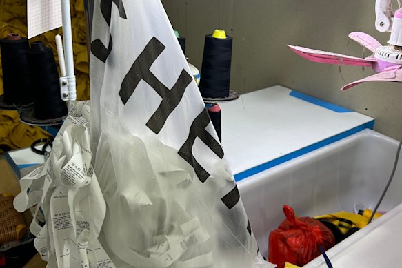 A Shein packaging bag hangs in a factory in Guangzhou’s fast-fashion district.