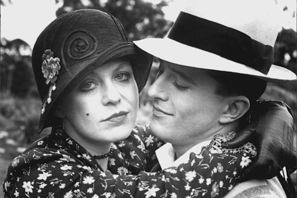 Squizzy Taylor (David Atkins) with his girlfriend Dolly Grey (Jacki Weaver) in a scene from the film directed by Dobson. 