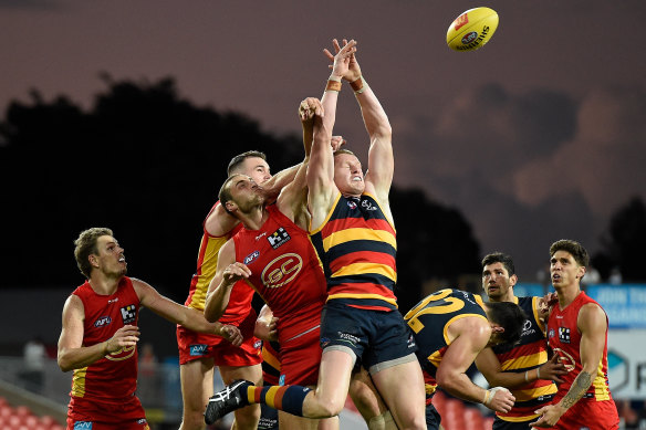 The pack goes up at Metricon Stadium.