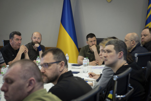 Ukrainian President Volodomyr Zelensky (centre) could face pressure from Western nations to win the war quickly.