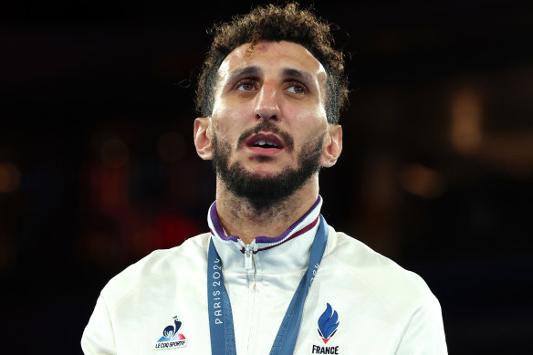 French boxer Sofiane Oumiha, who grew up in a poor area of Toulouse, says boxing should always have a place at the Olympics.