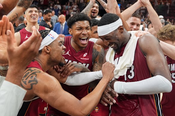 Bam Adebayo was mobbed by teammates after his 83-point game.