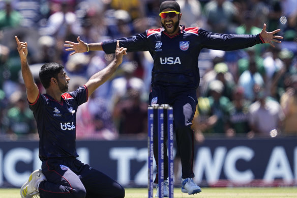 American players Saurabh Nethralvakar (left) and Harmeet Singh celebrate their triumph.