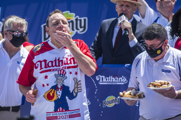 Joey Chestnut competes in the Nathan’s Famous Fourth of July International Hot Dog-Eating Contest in Coney Island’s Maimonides Park.
