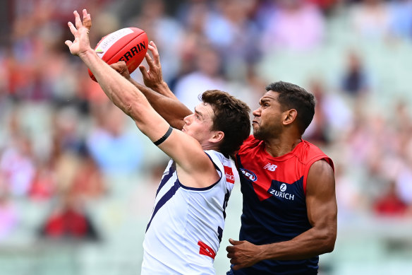 Neville Jetta spoils a mark by Blake Acres.