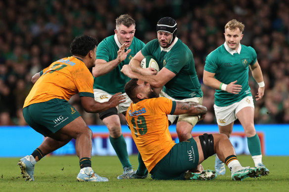 Wallabies defenders swarm Ireland’s Caelan Doris.