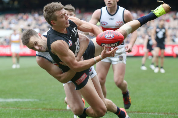 Blues co-captain Patrick Cripps leads the charge against Adelaide at the MCG on Saturday.