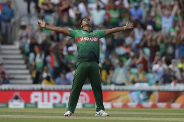 Bangladesh's Mohammad Saifuddin claims the scalp of South Africa's Rassie van der Dussen.