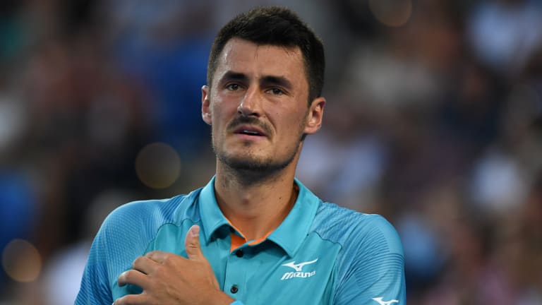 Bernard Tomic lost to Marin Cilic during day one of the Australian Open.