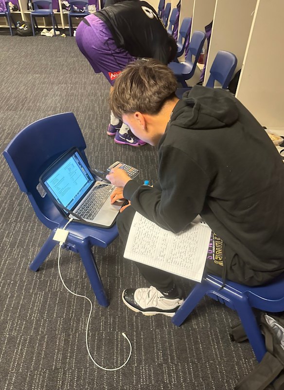 While his Sydney Kings teammates prepared for their NBL game, Henry Lau crammed for his business studies exam.