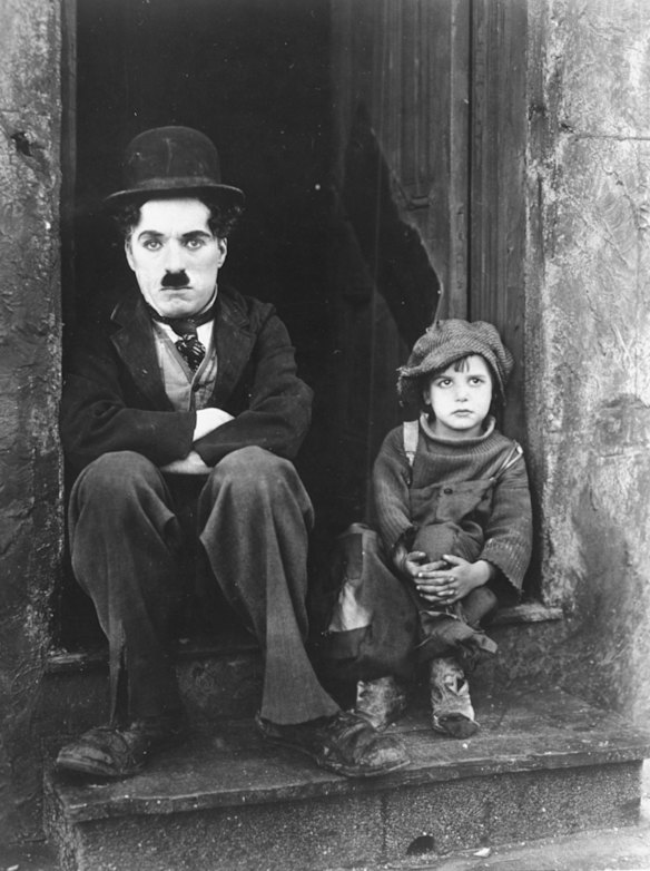 Charlie Chaplin and Jackie Coogan in his 1921 film The Kid.