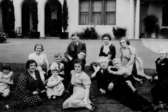 Joseph and Enid Lyons gathered on the lawn at The Lodge. The family maintained a home in Tasmania as well.
