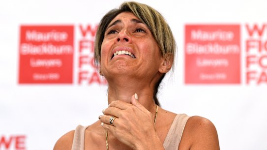 Westpac client Michelle Tate becomes emotional during a press conference at the offices of law firm Maurice Blackburn in Brisbane in February last year. Mrs Tate and her husband Ian were the lead litigants in the first class action against a big four bank after the publication of the Hayne Royal Commission Report. 