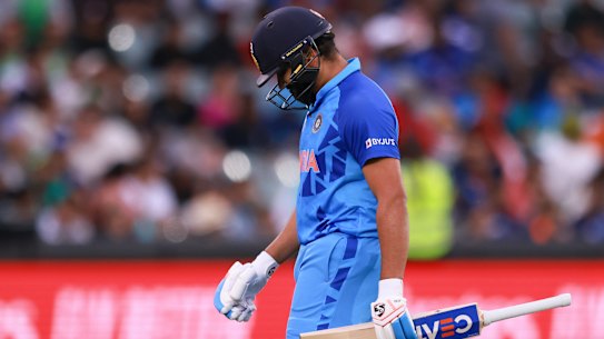 Rohit Sharma walks off.