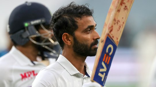 A restrained Ajinkya Rahane celebrates what could prove a crucial century at the MCG.