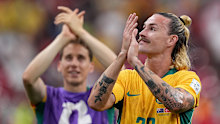 Socceroos midfielder Jackson Irvine celebrates with the crowd.