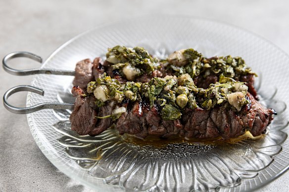 Lamb skewers topped with thyme salsa laced with bone marrow.