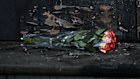 Flowers at the synagogue’s charred doorstep.