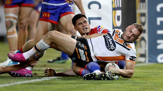 Milestone man: Robbie Farah scores a crucial try in his 300th match.