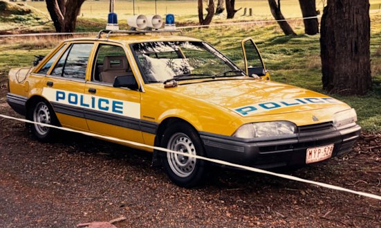 Sherwell’s police car at the scene of his confrontation with the bandit in country Victoria.