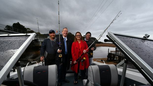 Ulverstone fishermen Troy Brooks (left) and Matt Talbot (right) at Heybridge boat ramp with Bill Shorten and Justine Keay as part of the publicity for Labor's $10m recreational fishing fund. 