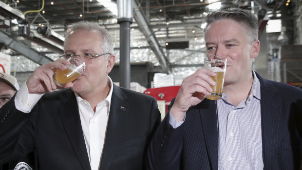 Treasurer Scott Morrison and Finance Minister Mathias Cormann at a Canberra boutique brewery.