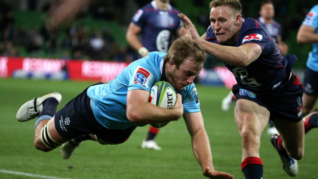 Big boots to fill: Will Miller scores a try for the Waratahs on Saturday  night.
