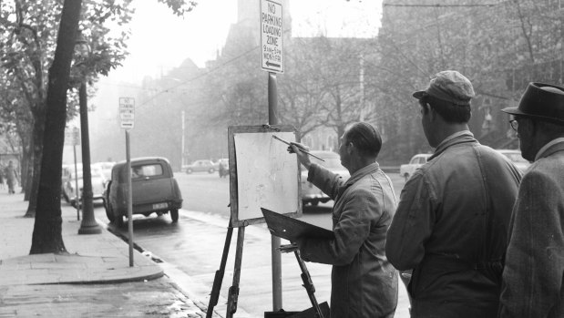 Mr. Dermot Hellier, at work near the corner of Collins Street and Russell Street, Melbourne, 1965. 