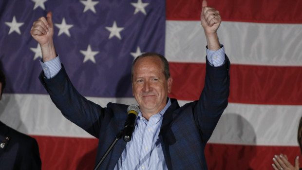 North Carolina 9th district Republican congressional candidate Dan Bishop celebrates his victory in Monroe.