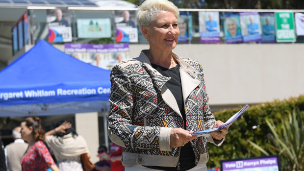 Kerryn Phelps handing out how-to-vote cards in Bondi on Friday. 
