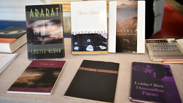 Books by Louise Gluck are displayed during the announcement of the 2020 Nobel prize in literature.