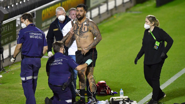 Andrew Fifita treated by paramedics after the game.