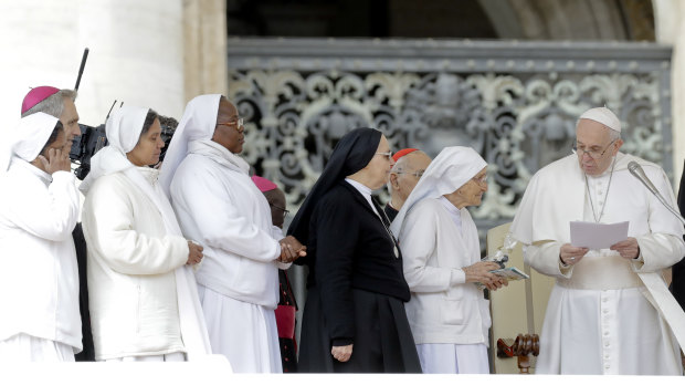 Pope Francis presents 85-year-old sister Maria Concetta Esu with a Pro Ecclesia et Pontifice award. The 85-year-old nun is an obstetrician who gave birth to some 3000 children during her 60 years of missions in Africa. 