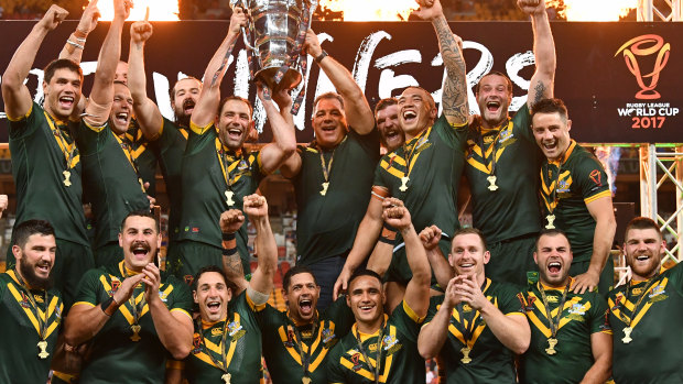 Top of the perch: Australia celebrate winning the Rugby League World Cup final.