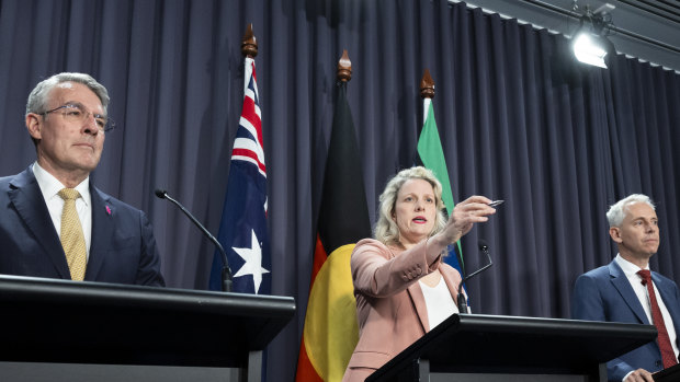 Ministers Mark Dreyfus, left, Clare O’Neil and Andrew Giles on Wednesday.